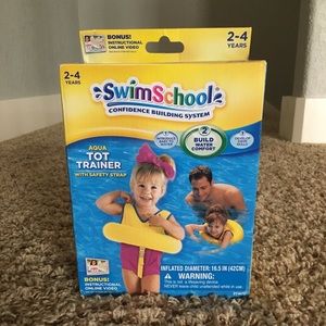 Swim school aqua tot trainer